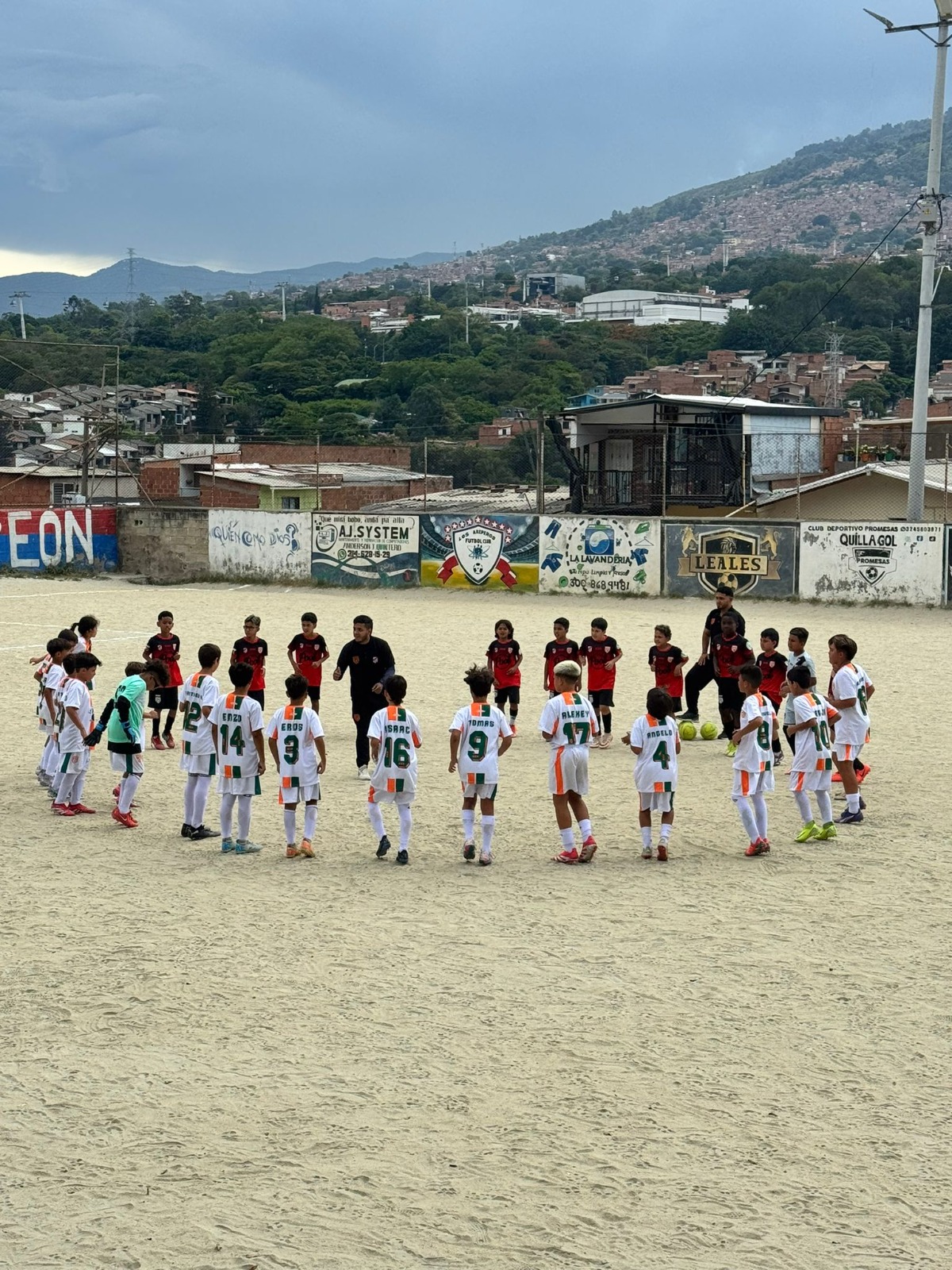 Children playing soccer during the Medellín community visit