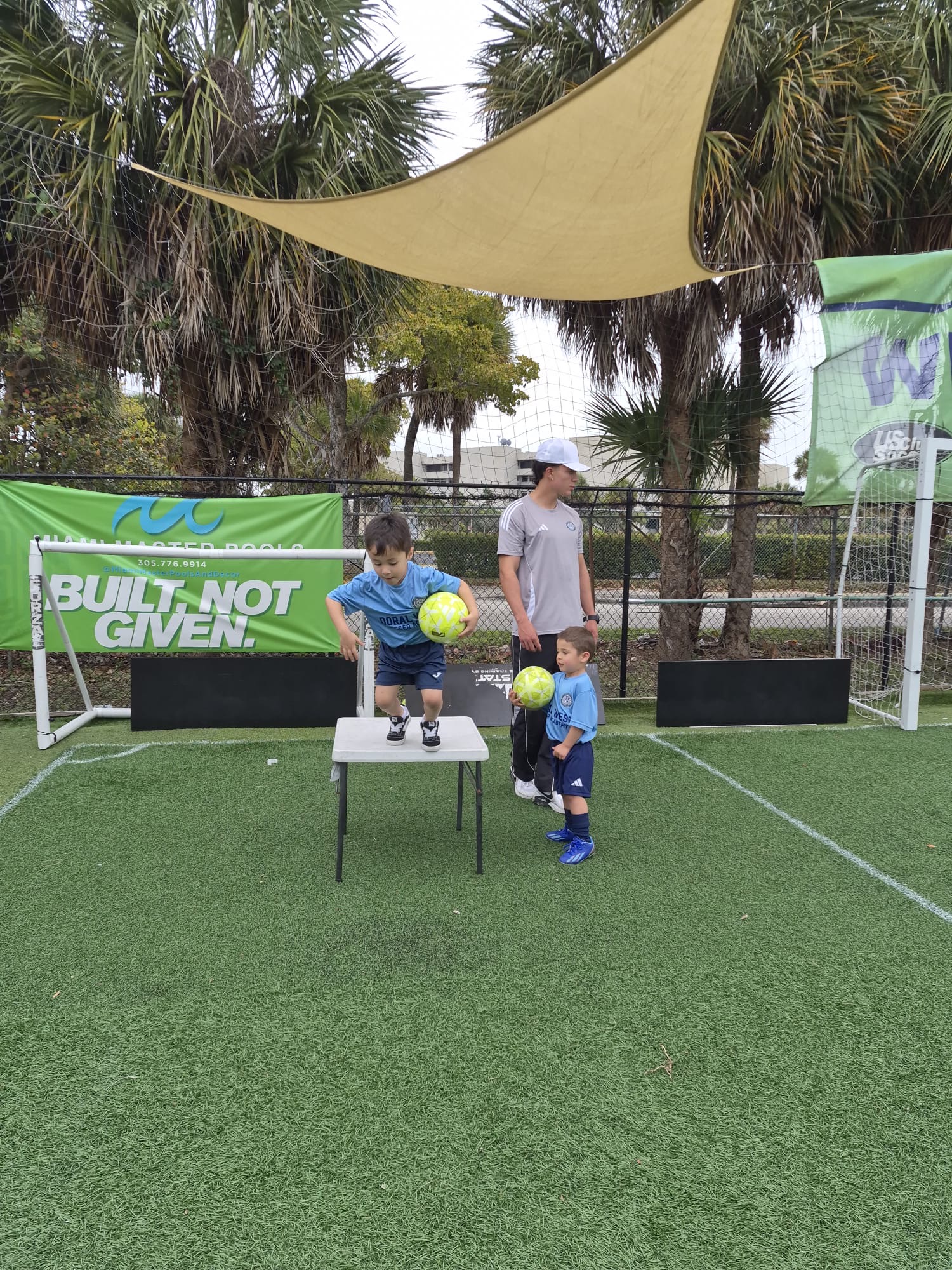 Young Doral West player learning soccer through play